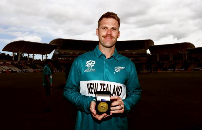 Lockie Ferguson with his Player of the Match award for New Zealand